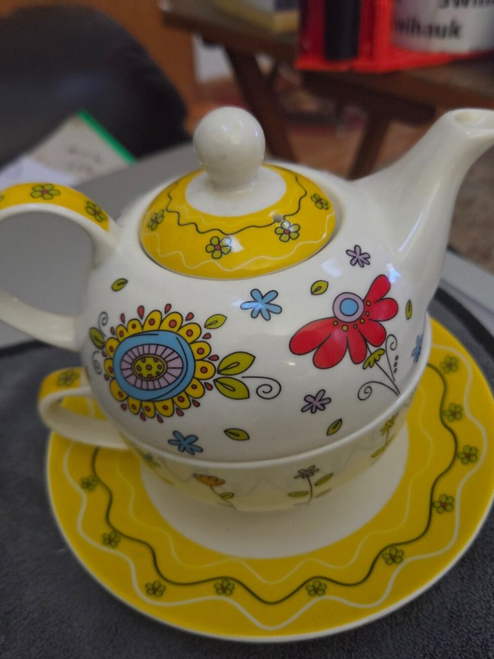 sweet little teapot and cup for one  whirley twirley design burton